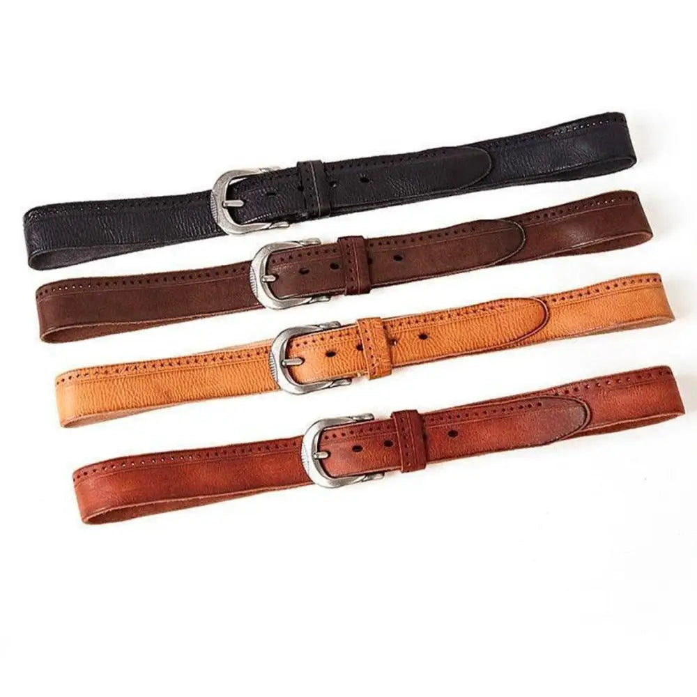 Four leather belts with silver buckles displayed alongside Ripped Blue Jeans