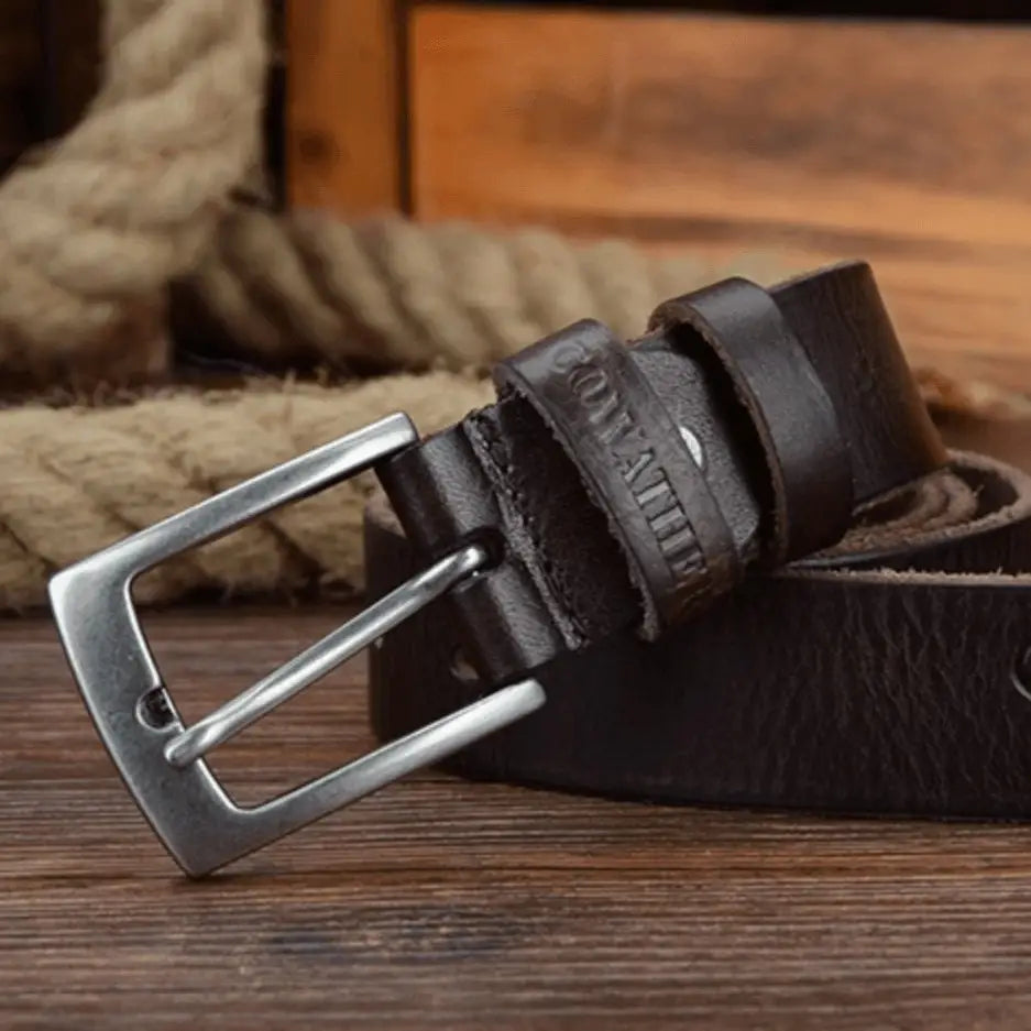 Brown leather belt with silver buckle shown in Leather Belts with Silver Buckles in Brown and Black