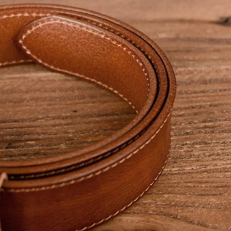 Brown leather belt with white stitching from Set of Three Leather Belts with Silver Buckles