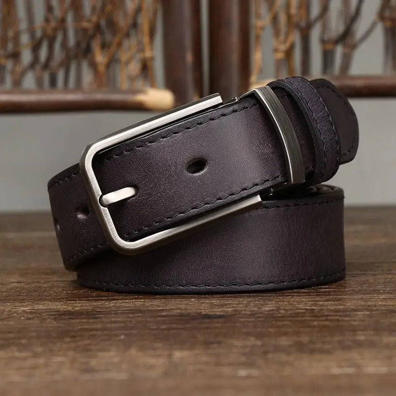 Set of three leather belts with silver buckles showcasing black leather belt style