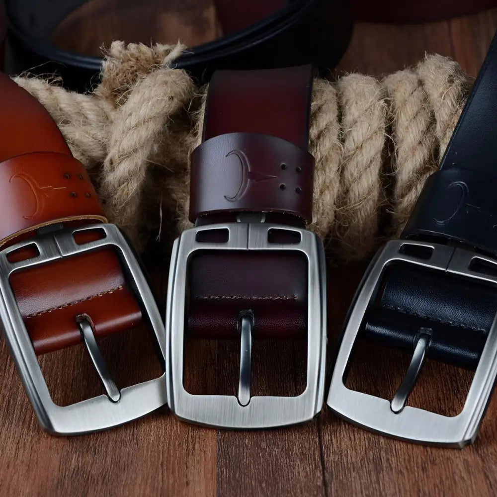 Three casual leather belts with metal pin buckles for men
