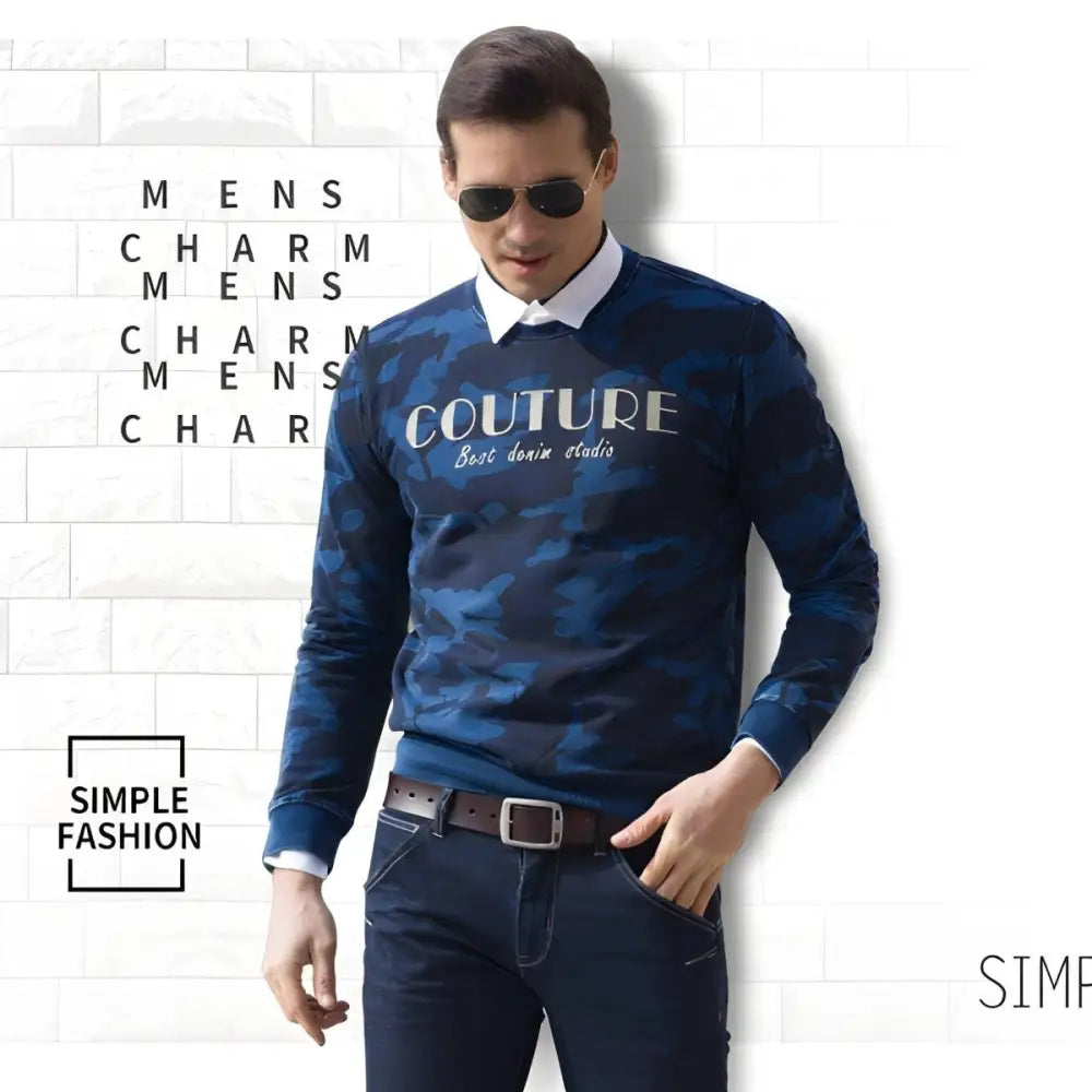 Man wearing a casual leather belt with a silver pin buckle and blue camouflage sweater