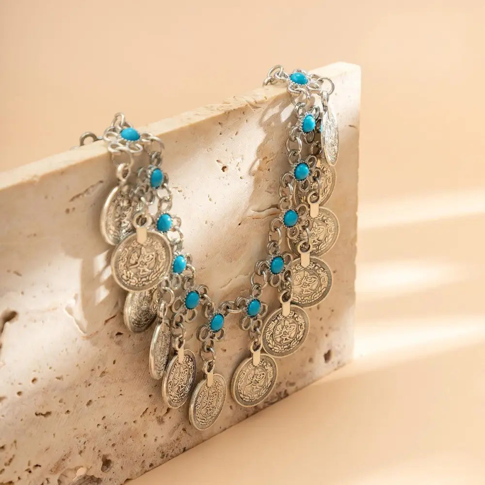 Elytie Chain Belt with Silver Coins and Turquoise Accents featuring a silver coin and necklace