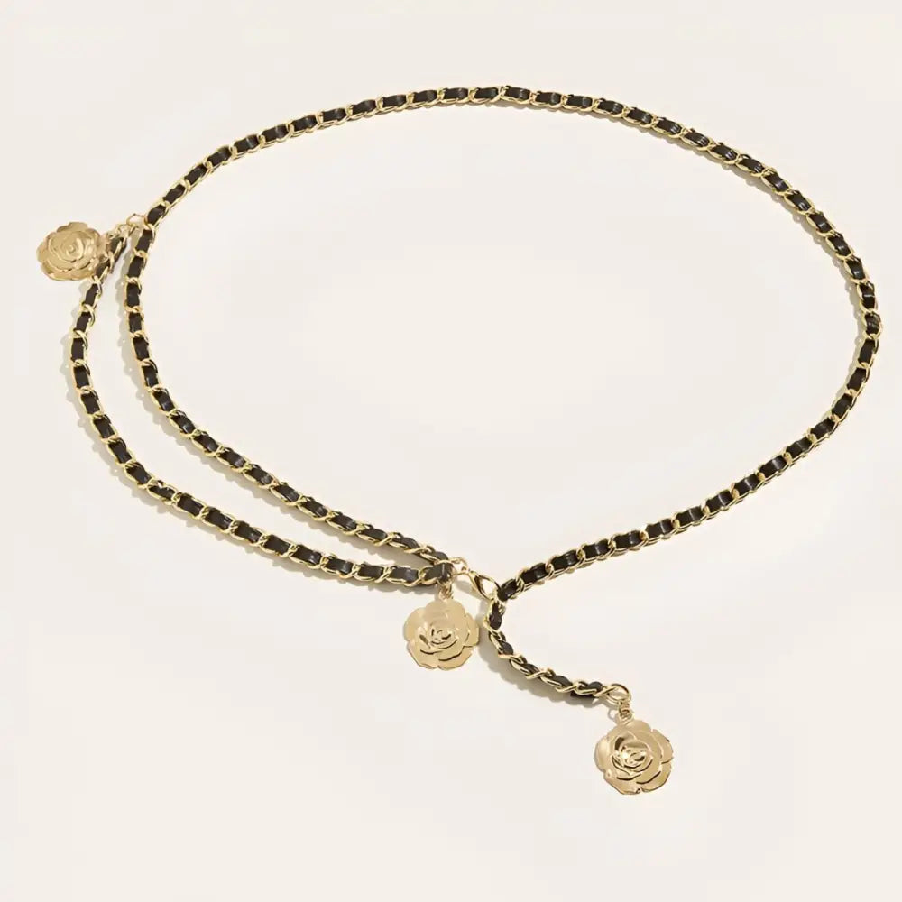 Gold chain belt with flower charms designed for black dresses and elegant accessories