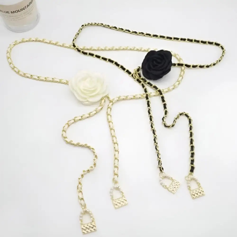 Chain belt with fabric roses and charms on Woman Black Pants for elegant fashion style