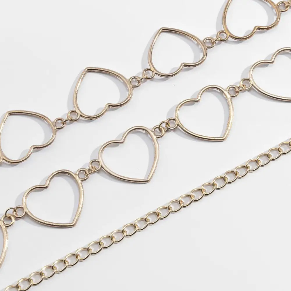 Gold-toned heart chain belt accessory for Black Pleated Skirt fashionable jewelry piece