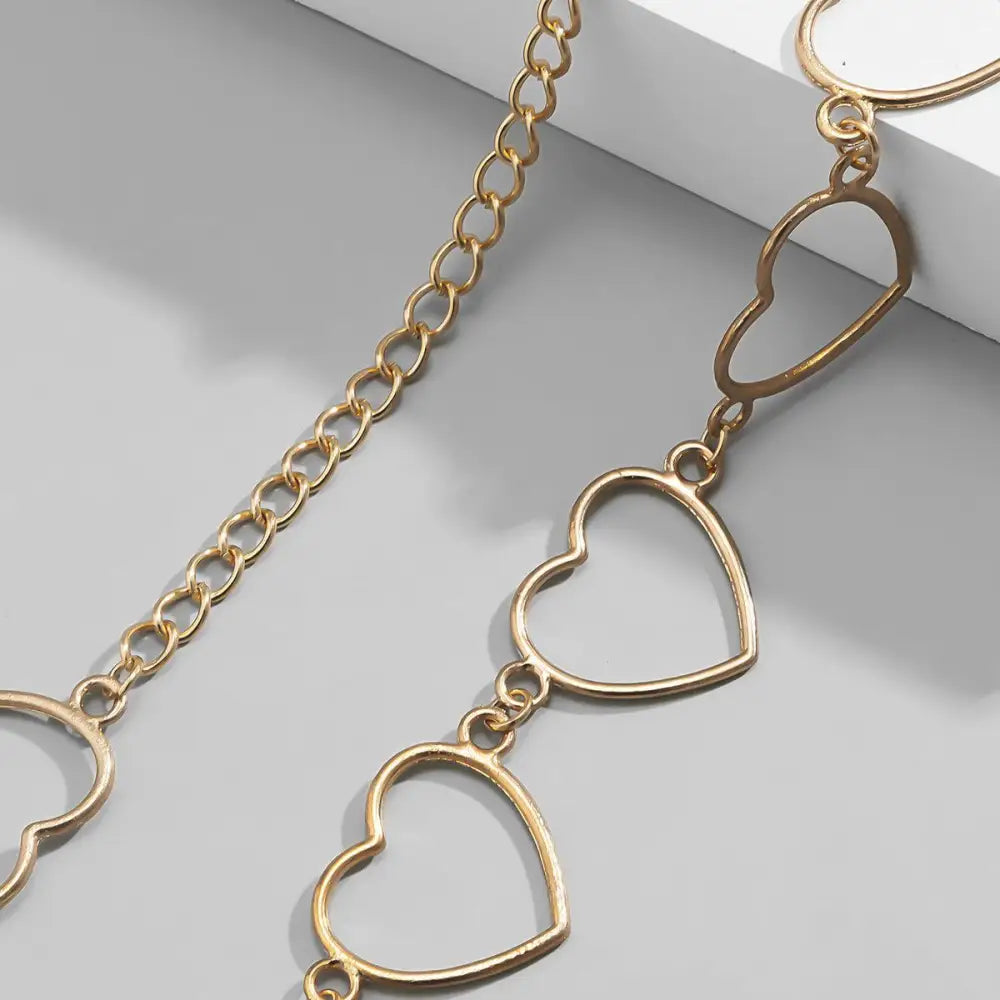 Gold-toned heart chain belt accessory for Black Pleated Skirt fashion styling