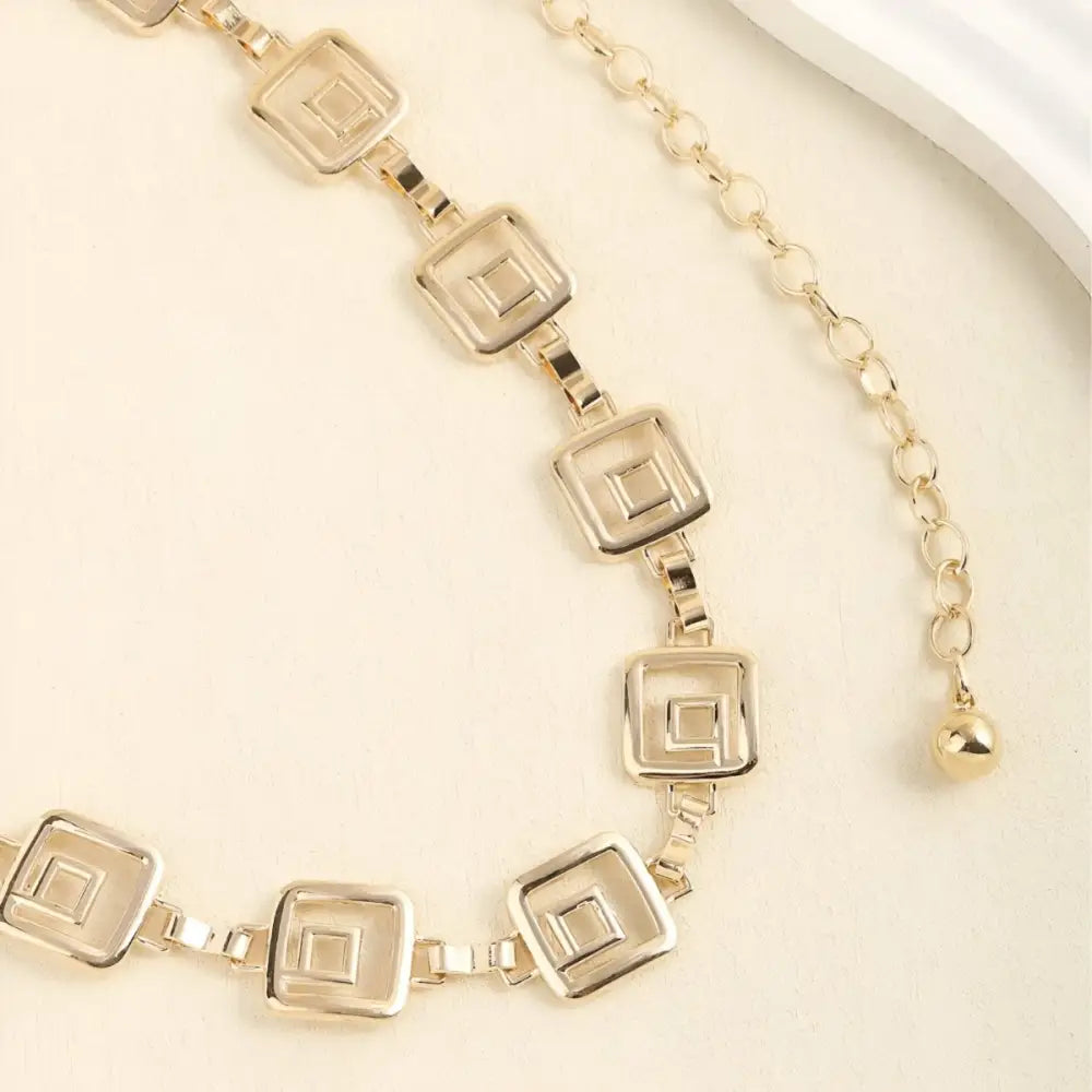 Gold Chemeris Chain Belt with Square Links and Hanging Chains for Elegant Style