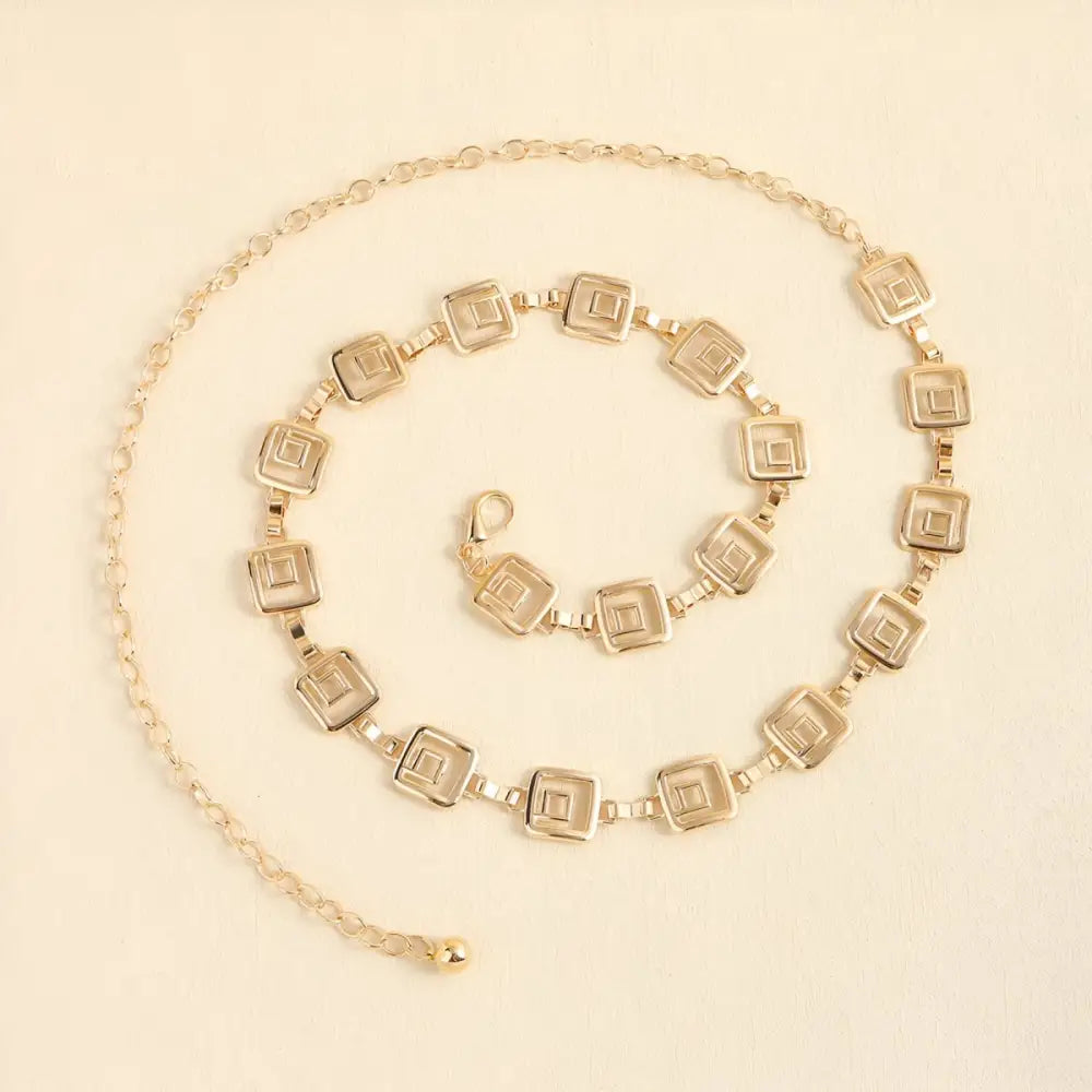 Gold Chemeris Chain Belt with Square Links and Hanging Chains for stylish accessories