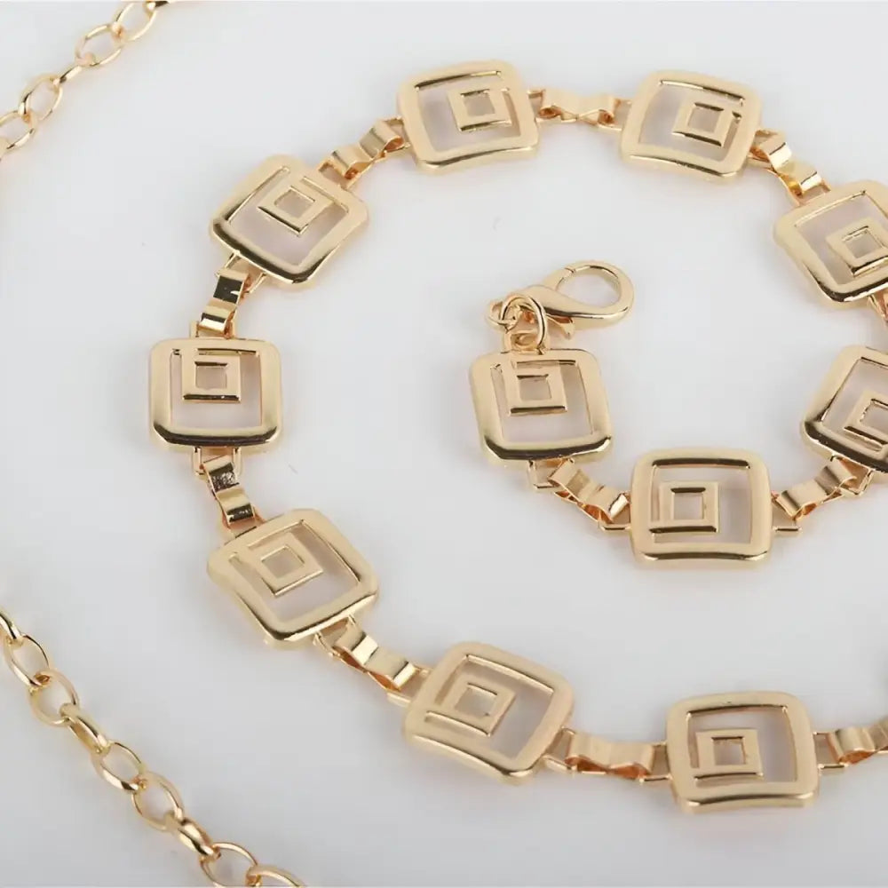 Gold-toned Chemeris Chain Belt with Square Links and Hanging Chains for elegant wear