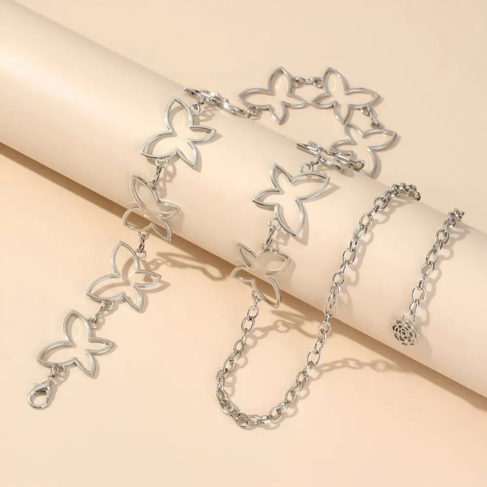 Silver butterfly chain belt on Galina model, stylish women’s chain belt accessory
