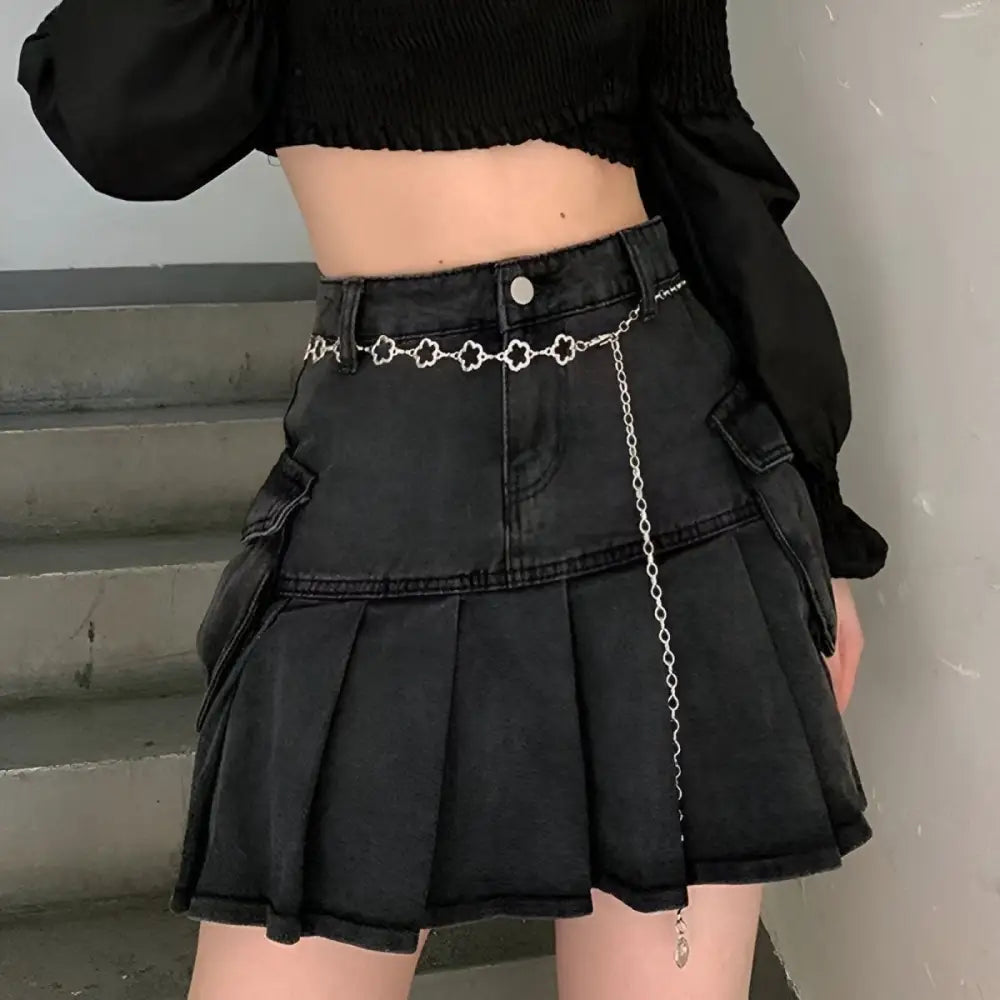 Dark pleated denim skirt with chain belt featured in Light Blue High-Waisted Jeans collection