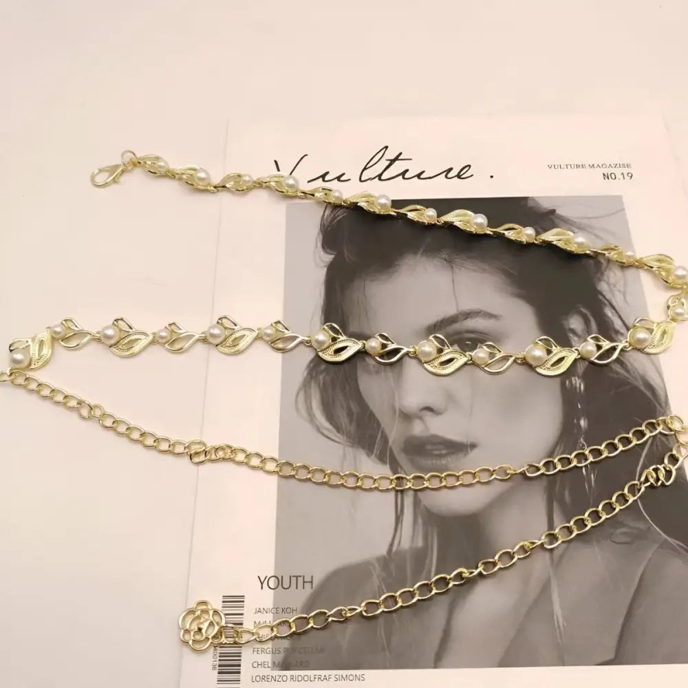 Gold-tone pearl and chain belt on Oborina Model Beige Blazer for elegant fashion styling