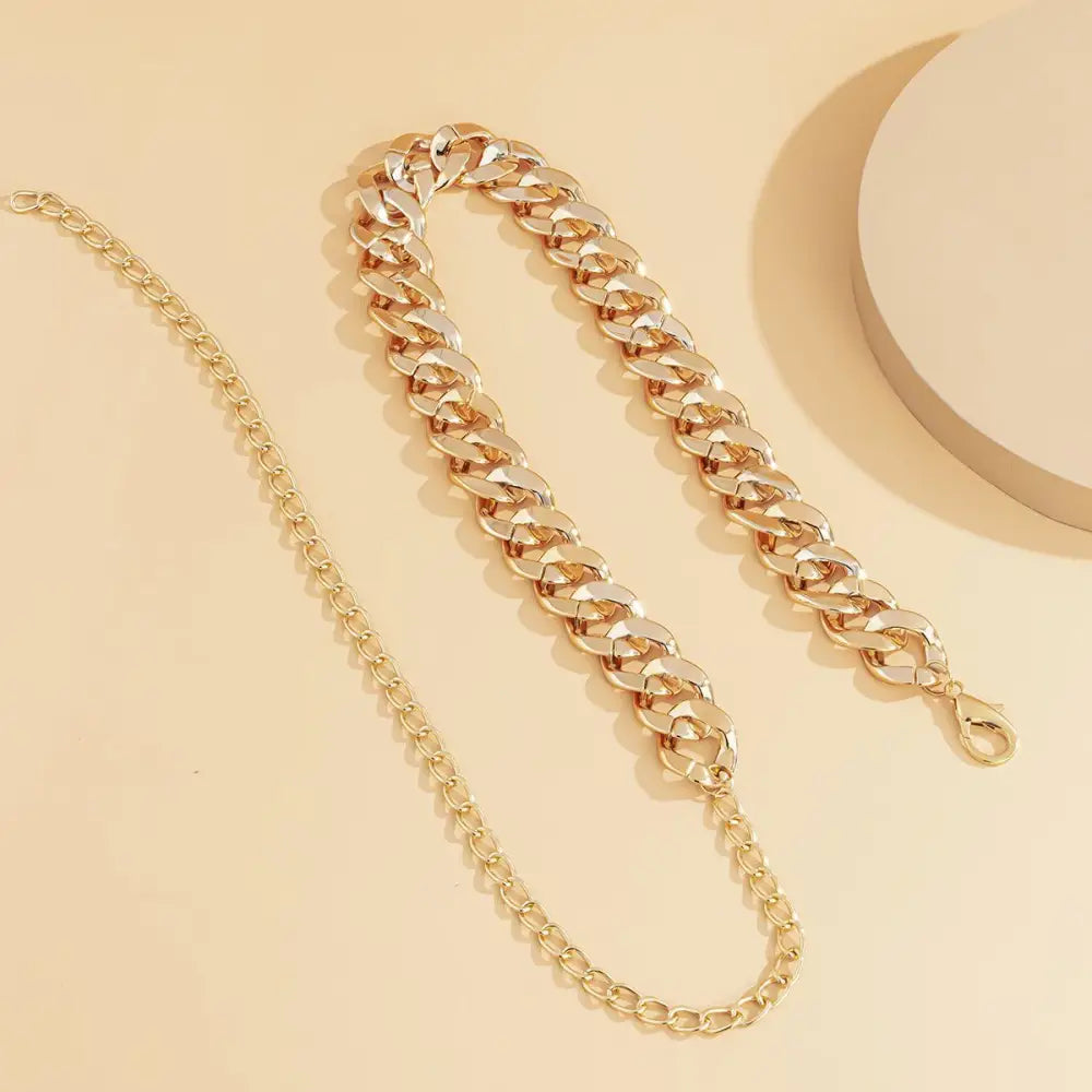 Gold-toned chain purse strap detail on stylish Silver-Toned Gold Chain Belt for everyday wear