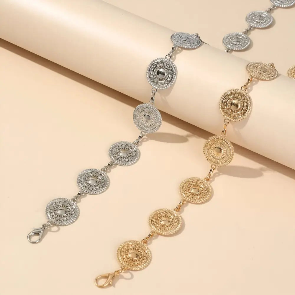 Gold and silver coin-linked orya chain belt with circular medallions for black mini skirt