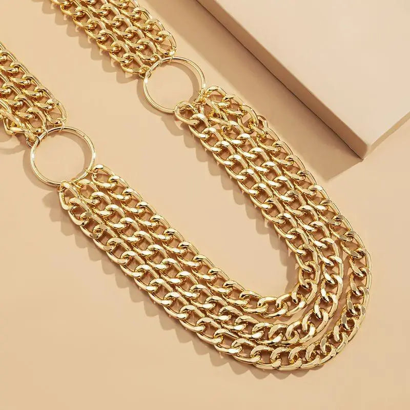 Gold-toned multi-strand chain belt with rings for Sadestris women’s chain belt collection