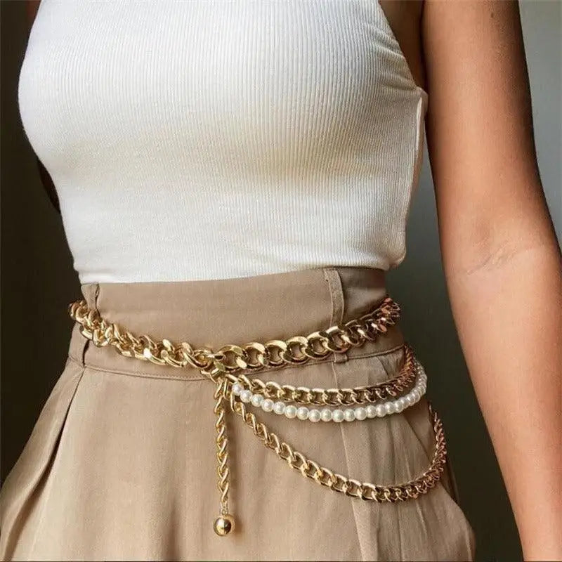Gold chain belt with pearl accents showcasing elegant waist jewelry design