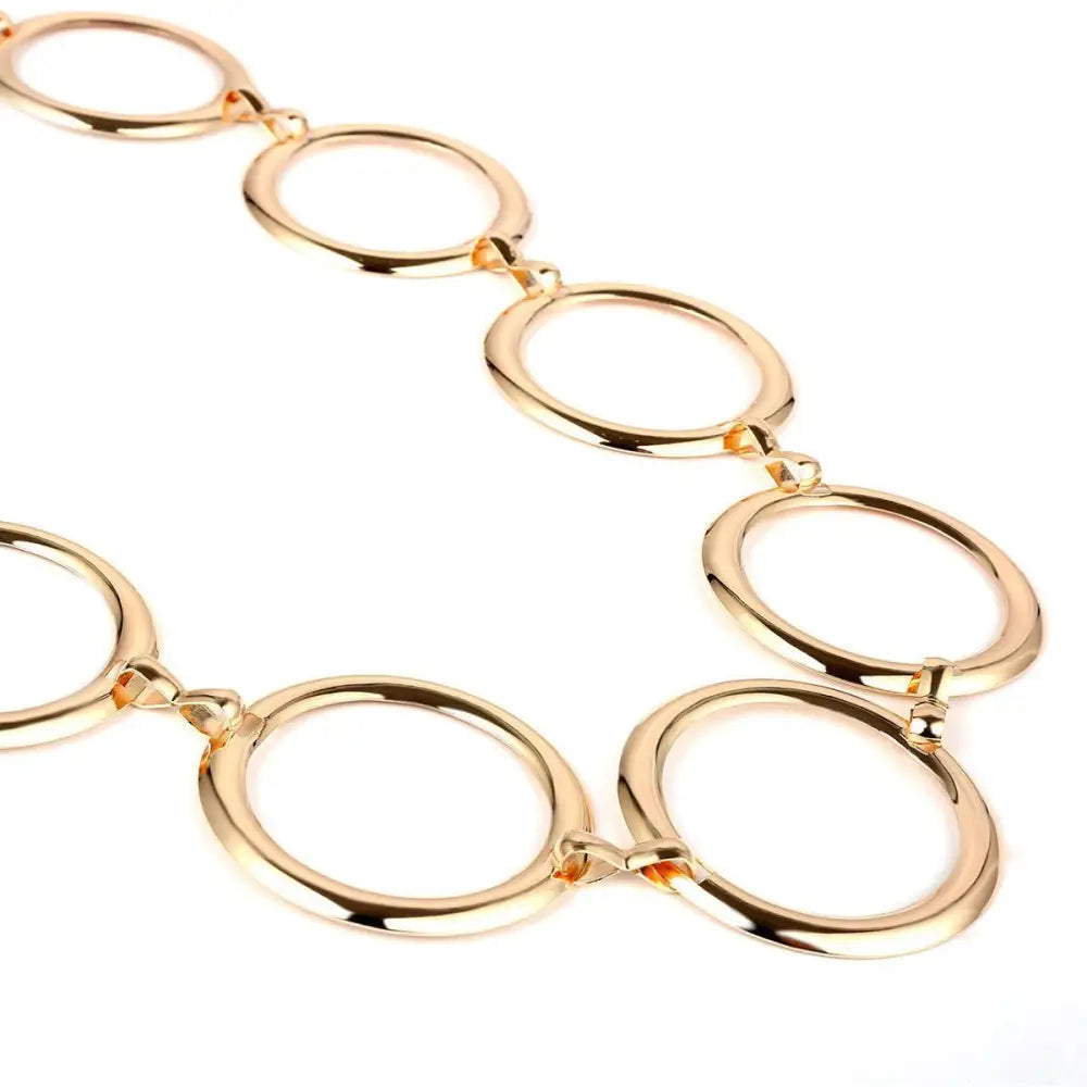 Gold-toned linked circle chain belt perfect for black dresses and elegant styling