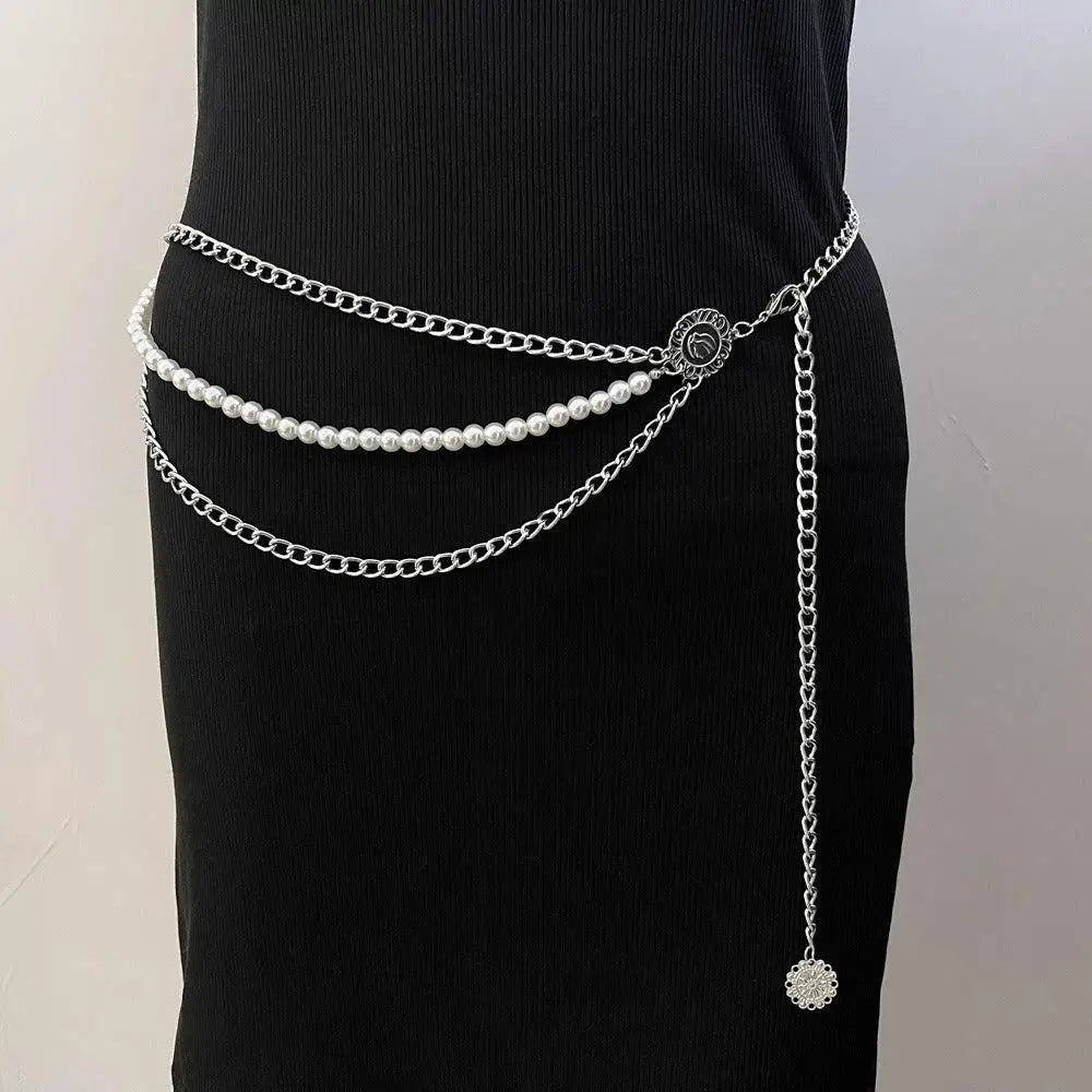 Silver chain and pearl waist belt from Veagea Chain Belt collection with silver accents
