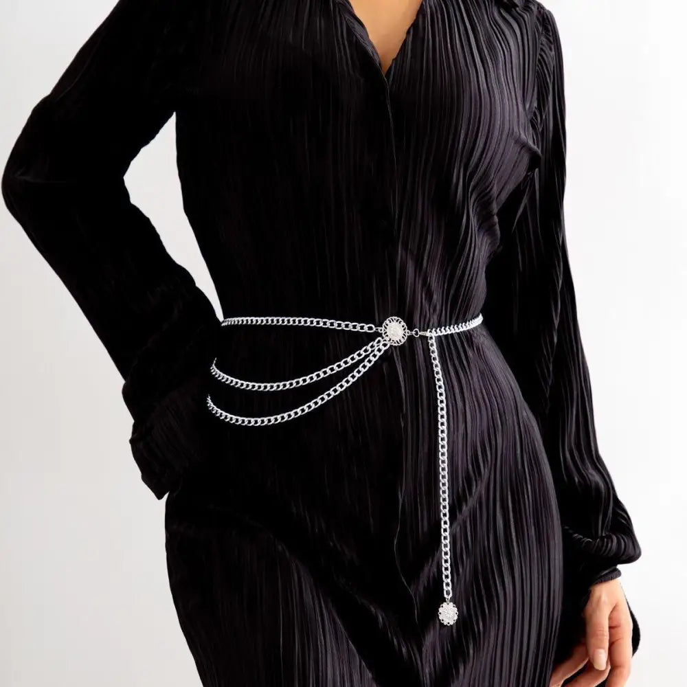 Silver chain belt with embellishments from Gold and Silver Chain Belts with Layered and Embellished Designs