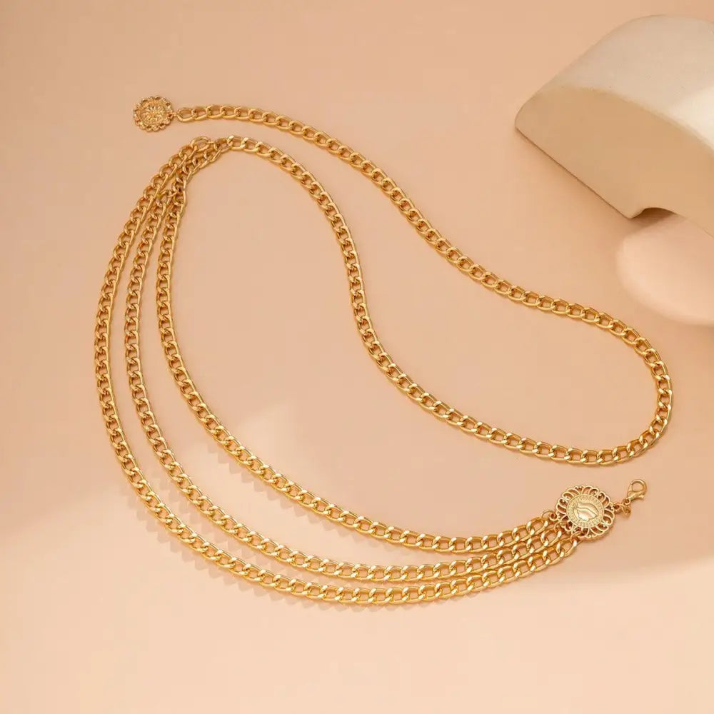 Gold-toned chain belt from Gold and Silver Chain Belts with Layered and Embellished Designs
