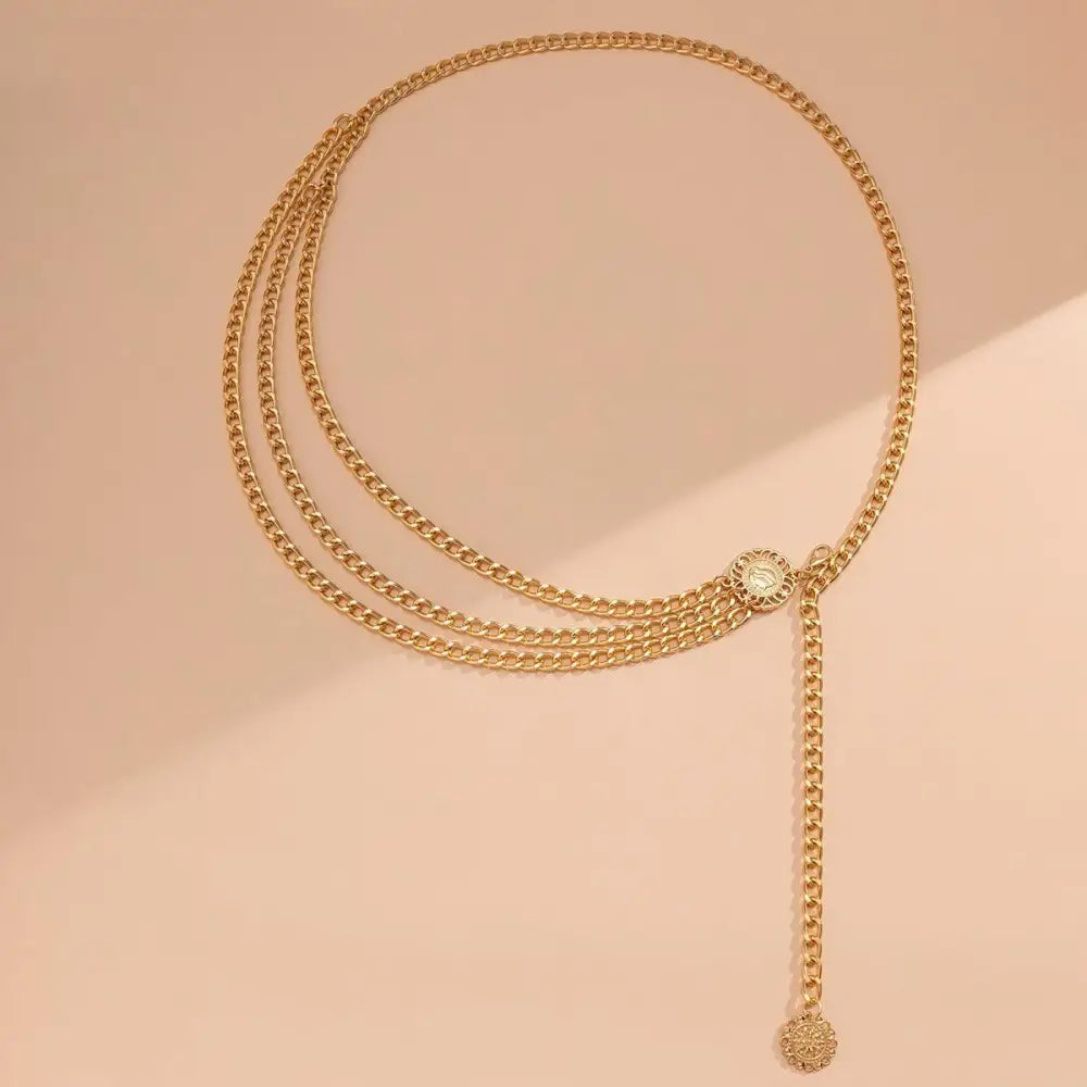 Gold-toned layered chain belt with embellished design from Gold and Silver Chain Belts collection