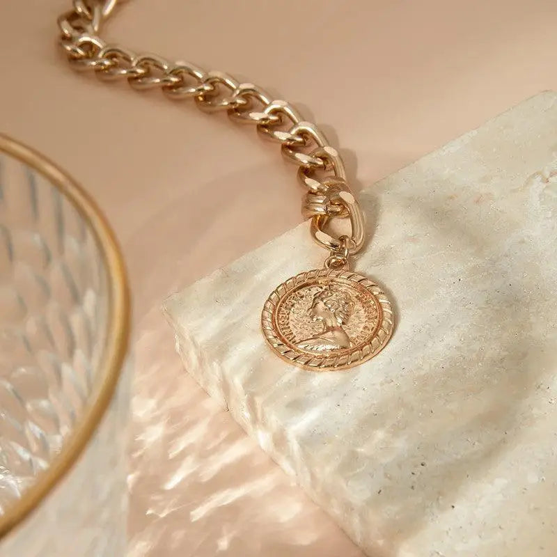 Gold chain necklace featuring a coin pendant from the Gold and Silver Coin Pendant Chain and Belt Options collection