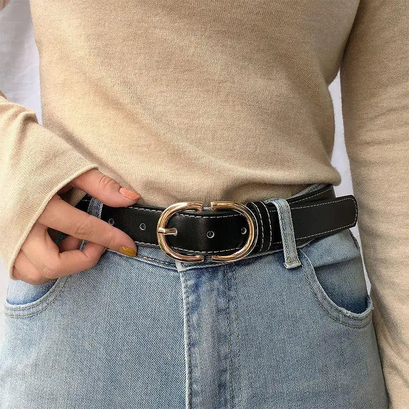 Black leather belt with a gold buckle for a stylish and elegant accessory