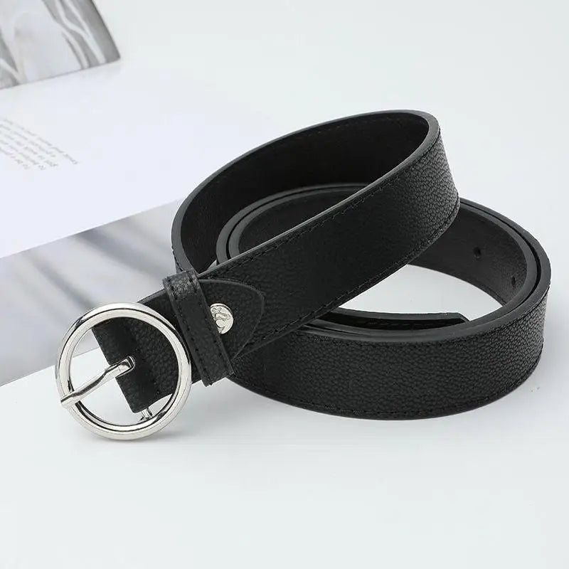 Black leather belt with circular silver buckle from Murielle Belt collection
