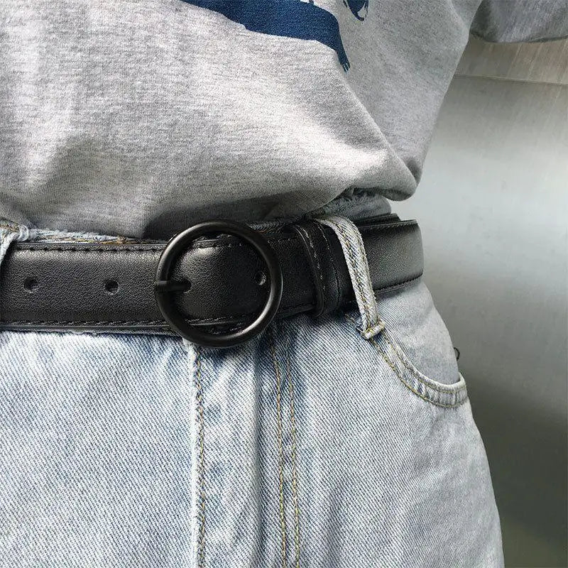 Black leather belt with round buckle displayed in the product Black Leather Belt with Round Buckle