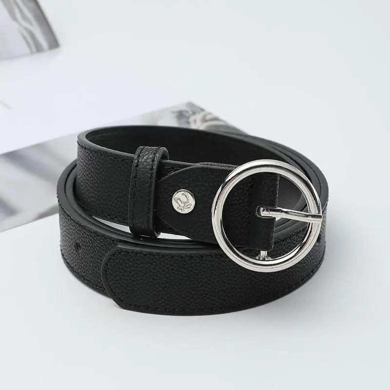 Black leather murielle belt with circular silver buckle for stylish outfits
