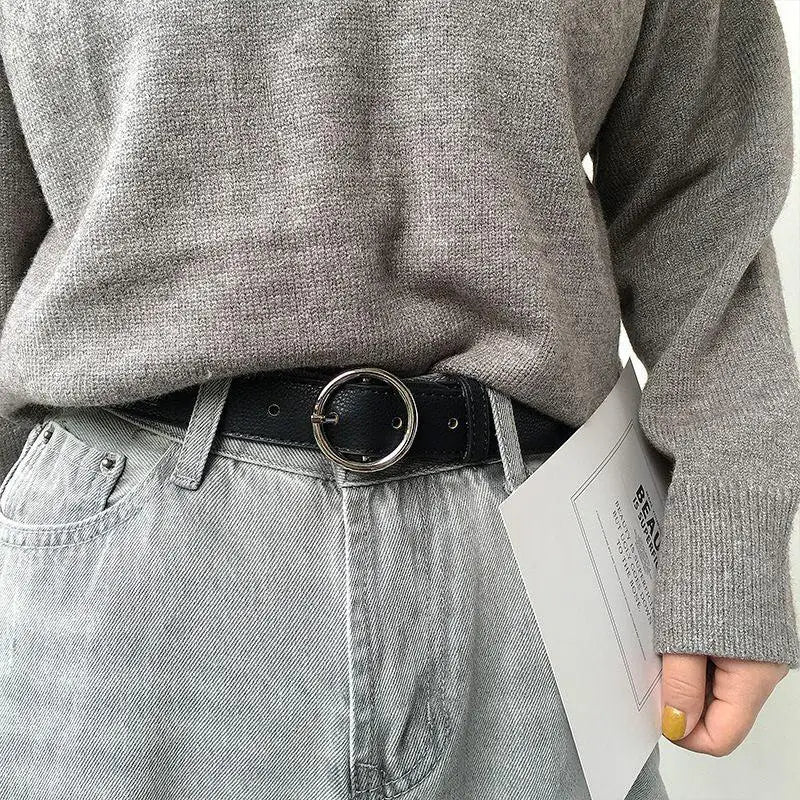 Gray sweater styled with Murielle Belt Black Leather with Circular Silver Buckle