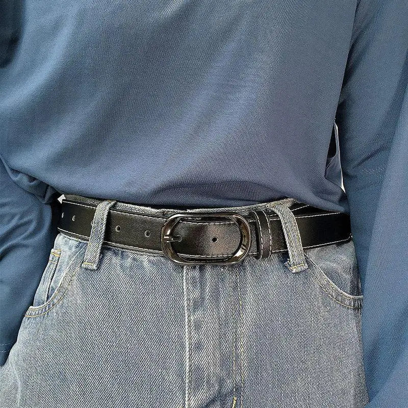 Black leather belt with a silver buckle, showcasing premium craftsmanship and style