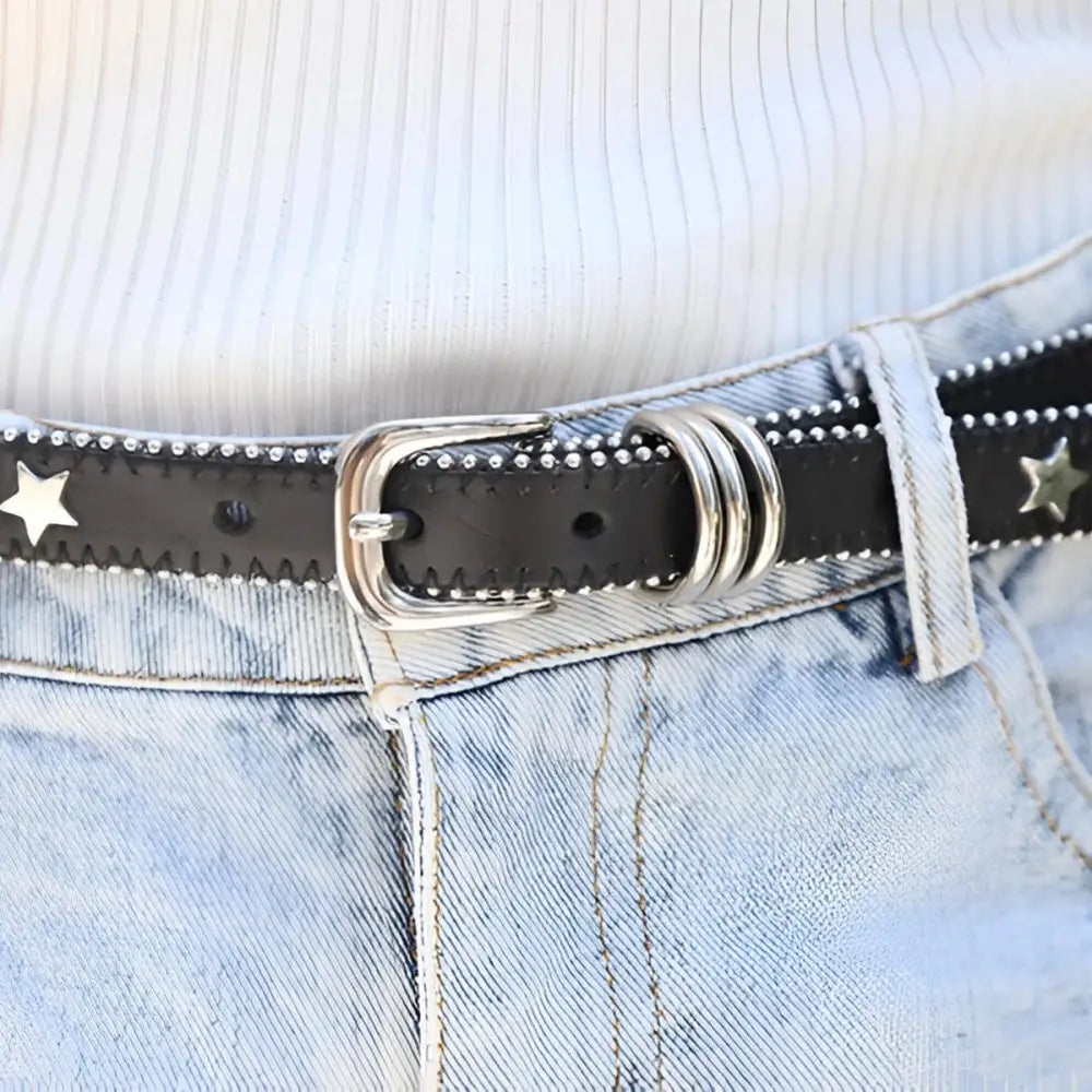 Black star-studded belt displayed with Women’s Denim Shorts with Side Stripe and Star Accents