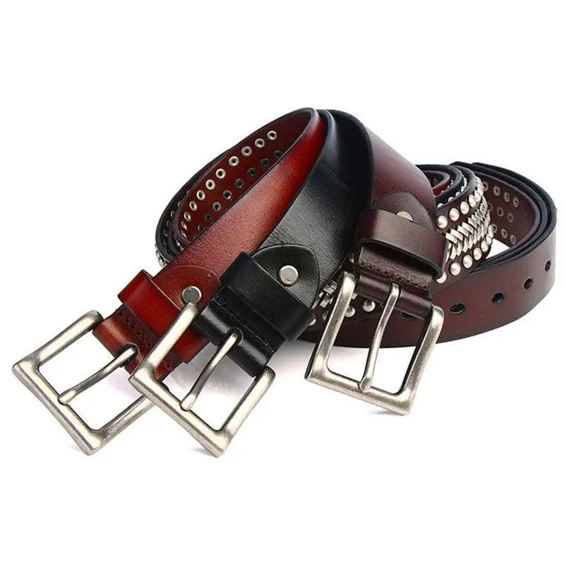 Assorted leather belts with metal buckles and studded design for stylish accessories