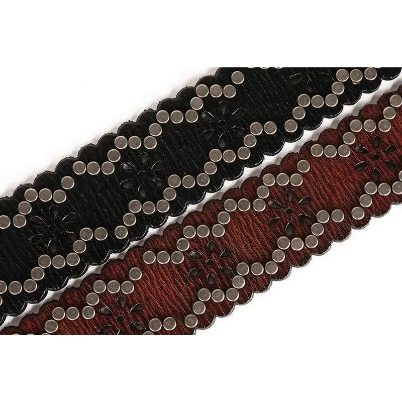 Elmyra belt with silver studs and scalloped edges in black and brown leather