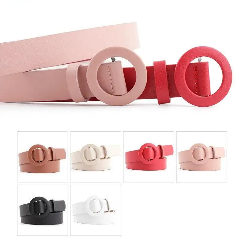 Assorted round-buckle leather belts displayed in various colors from the Collection