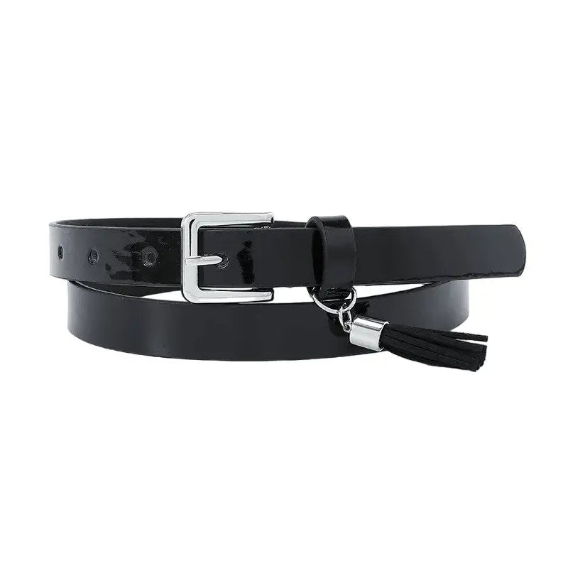 Black patent leather women’s belt with silver buckle and tassels for stylish fashion accessories