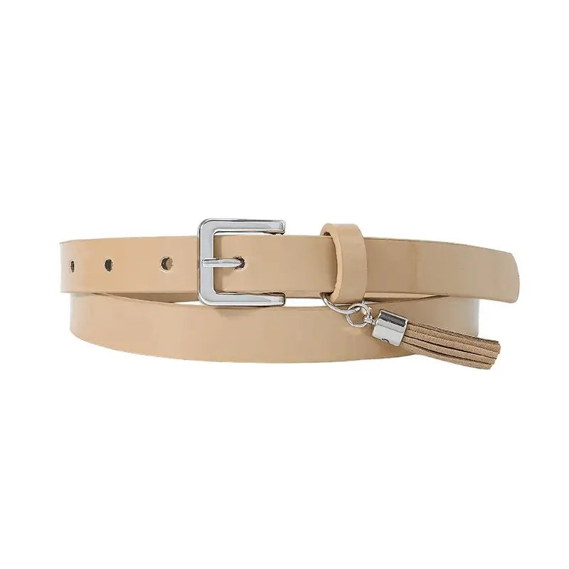 Beige women’s belt with silver buckle and tassels for stylish accessory use