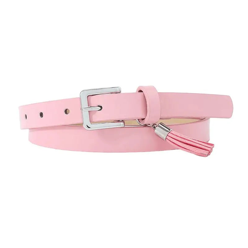 Pink women’s belt with silver buckle and tassels for stylish accessory enhancement