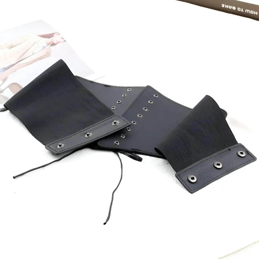 Black corset belt with lace-up design for a stylish and elegant look