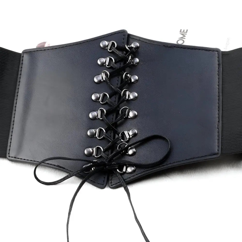Black faux leather corset belt with lace-up design for a stylish and elegant look
