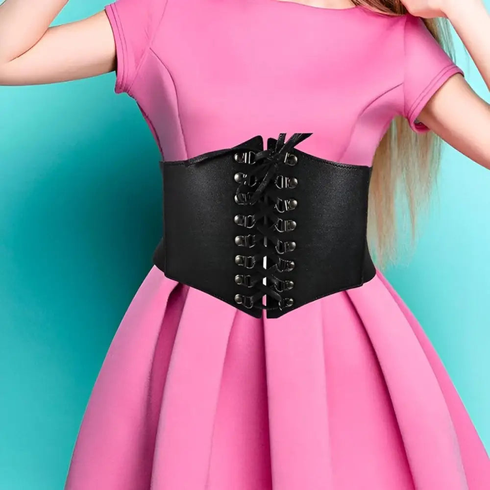 Pink dress with black corset belt for a stylish and elegant look