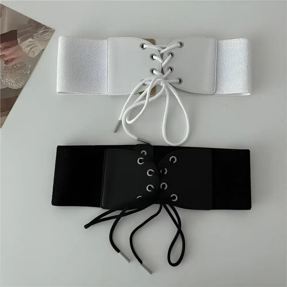 Black and White Corset Belt with Lace-Up Front for Elegant Styling featuring two corset belts