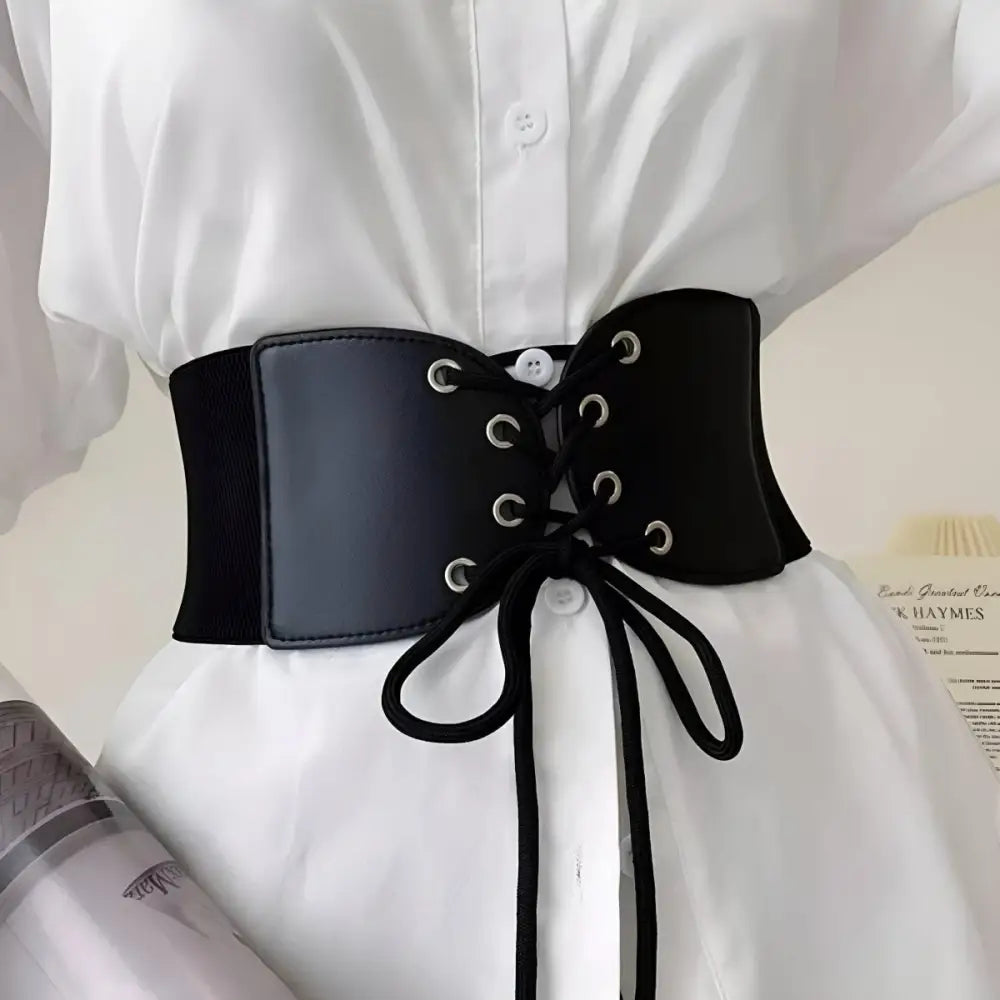 Black corset belt with lace-up front for elegant styling and slimming effect