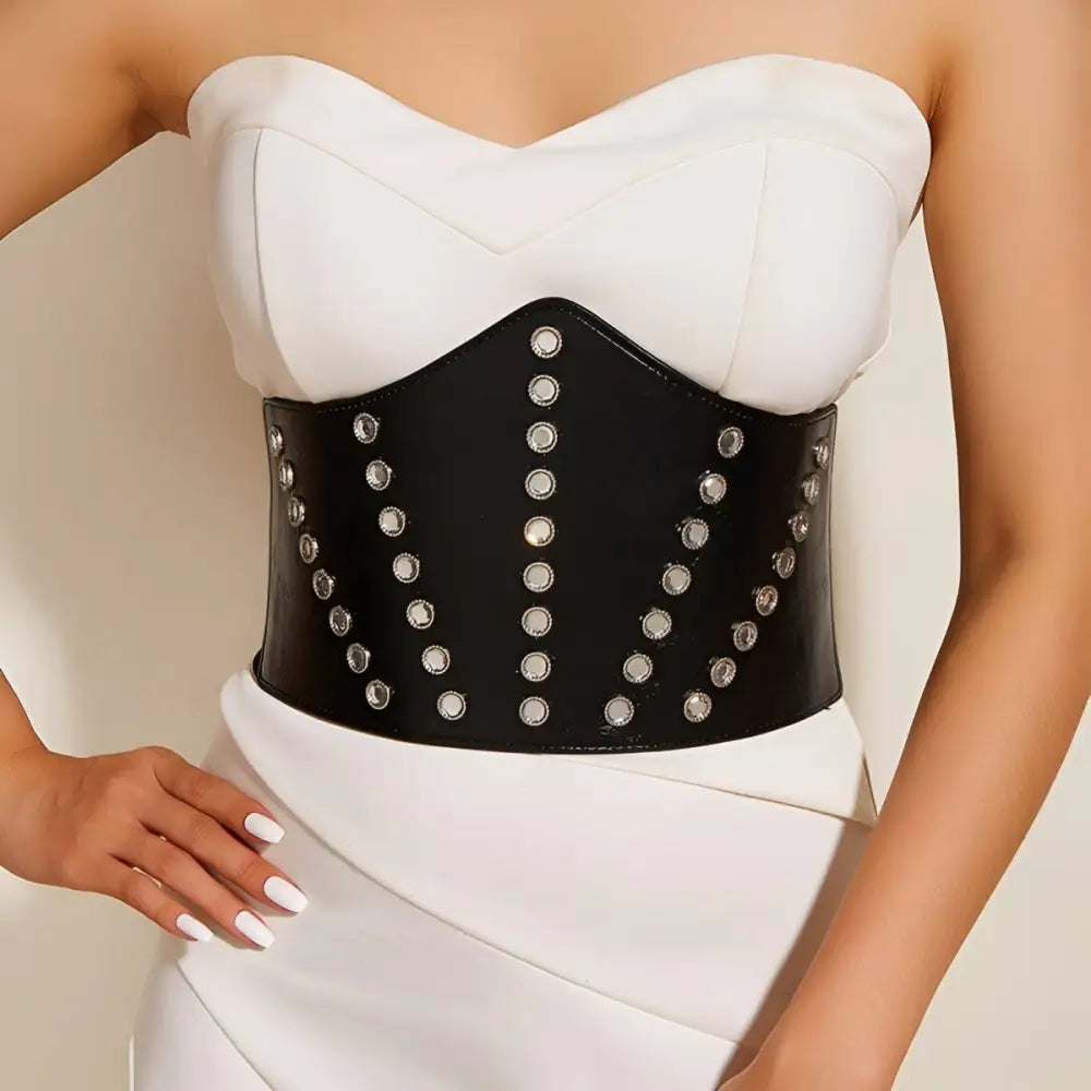 Black riveted corset belt with studs for stylish waist definition and fashion accentuation