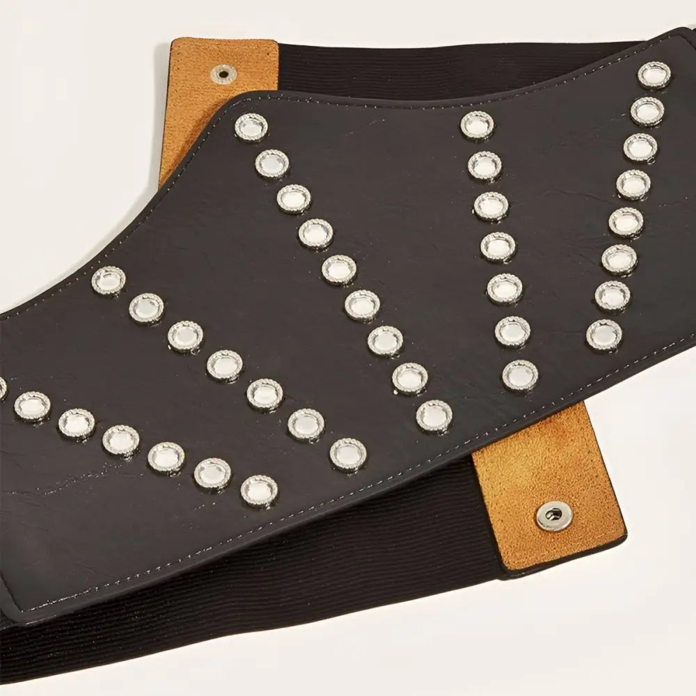 Black riveted corset belt with studs for stylish waist definition and fashion enhancement