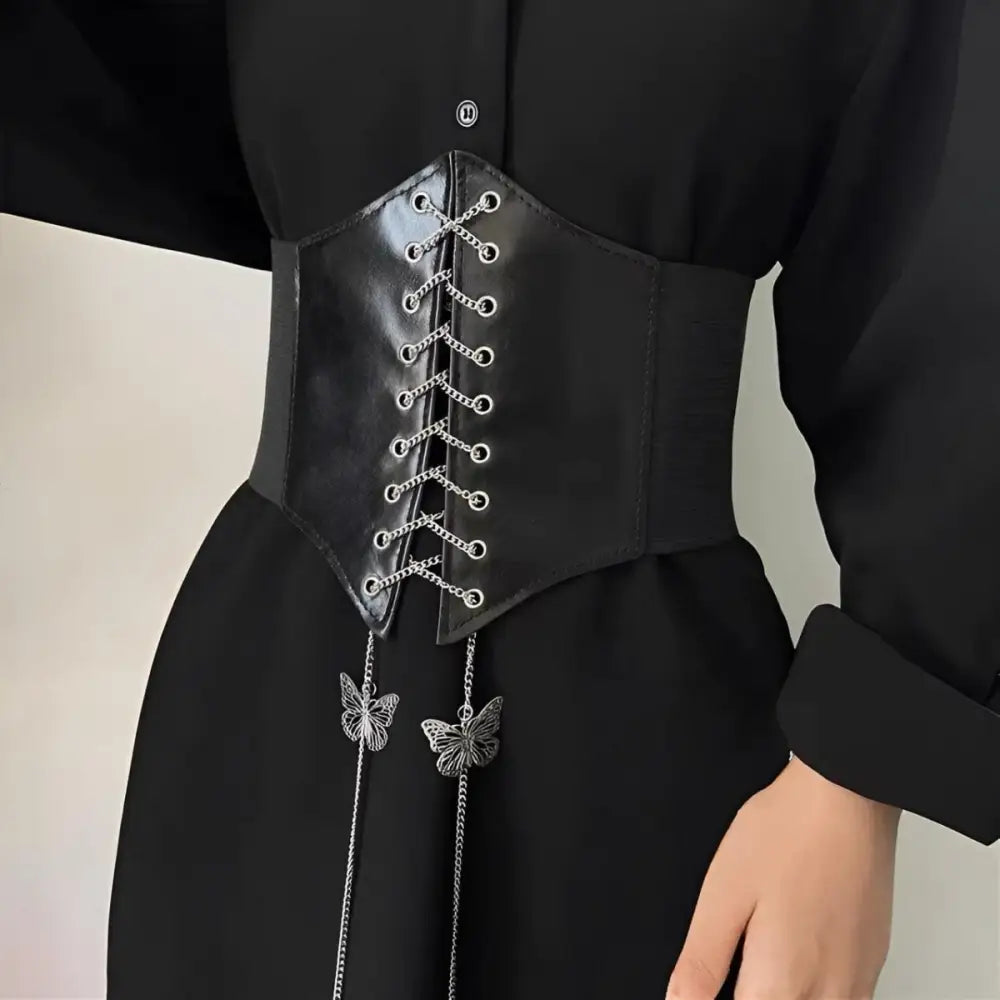 Black corset belt with butterfly chain accents for stylish wear and elegant fashion
