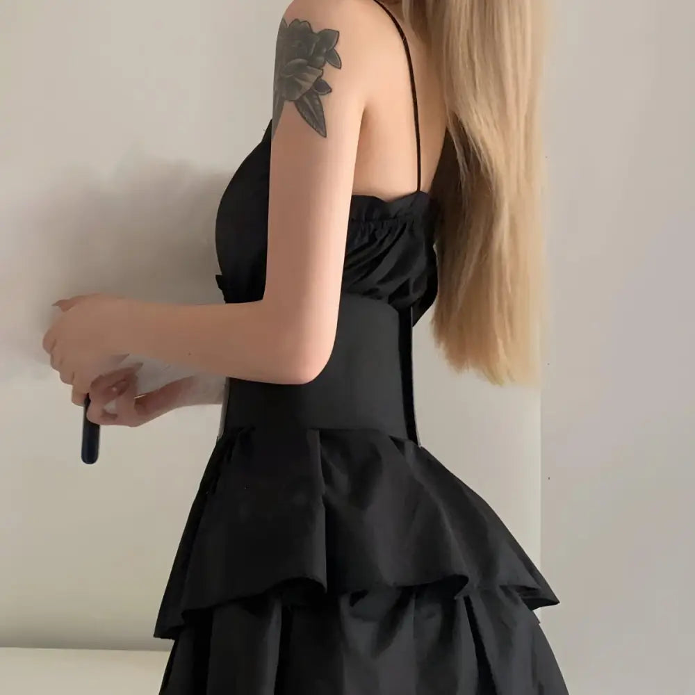 Black tiered ruffle dress paired with Kayla Corset Belt in the White Shirt Dress edition