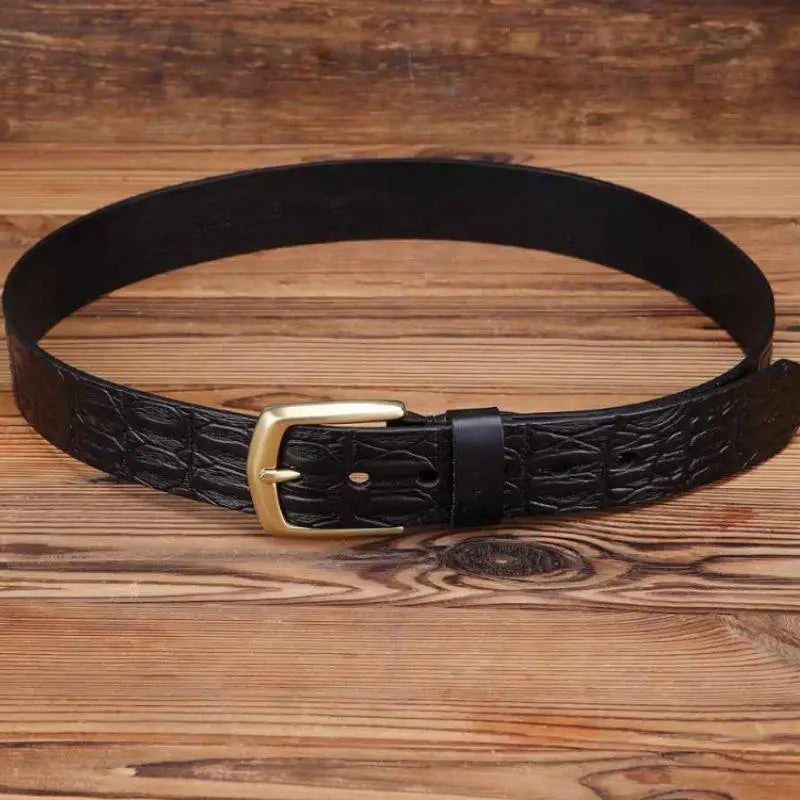Black crocodile-effect leather belt with gold buckle for a stylish accessory display
